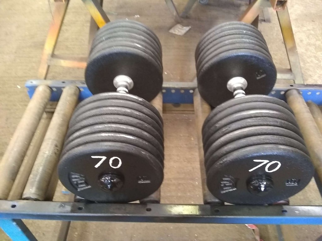 Welded metal dumbbells